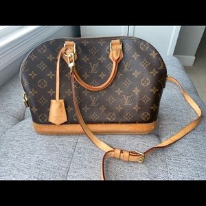 Louis Vuitton Alma PM Monogram with leather strap. Tote/ Crossbody